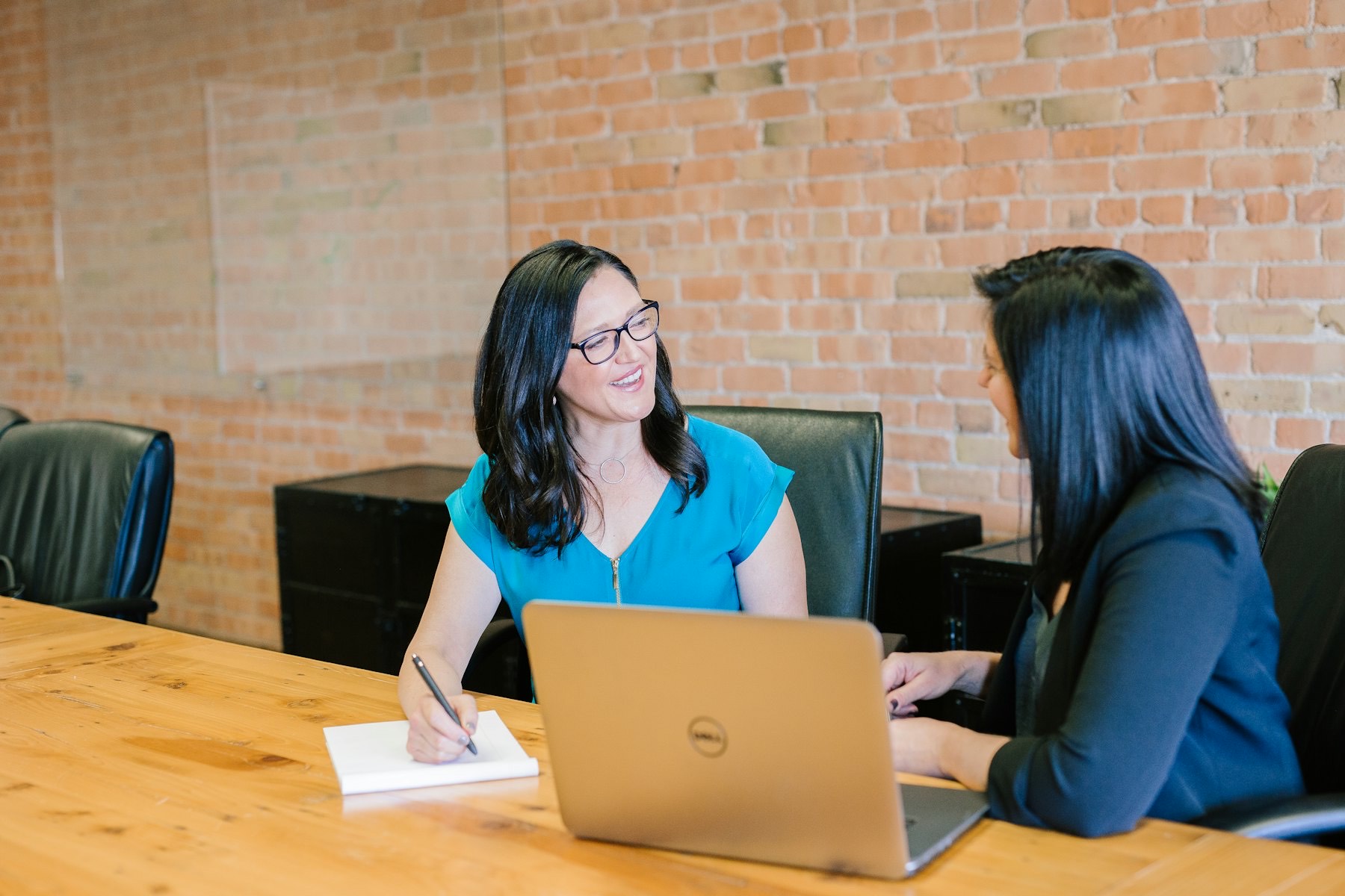 Shuraka Services advisers meeting a client
